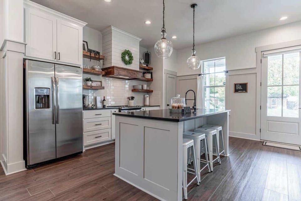Kitchen and bar area. Let me know if you would like access to a private chef during your stay! Family breakfasts and dinners can be prepared easily with a fully stocked kitchen for the family chef.