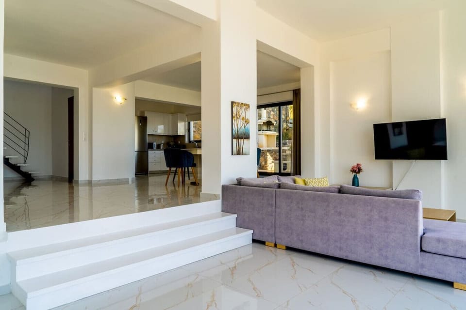Bright open-plan living and kitchen, ideal for cooking and relaxing together.