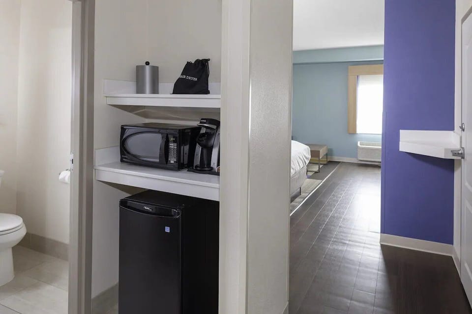 Start mornings easy with microwave, coffee station, and mini fridge.