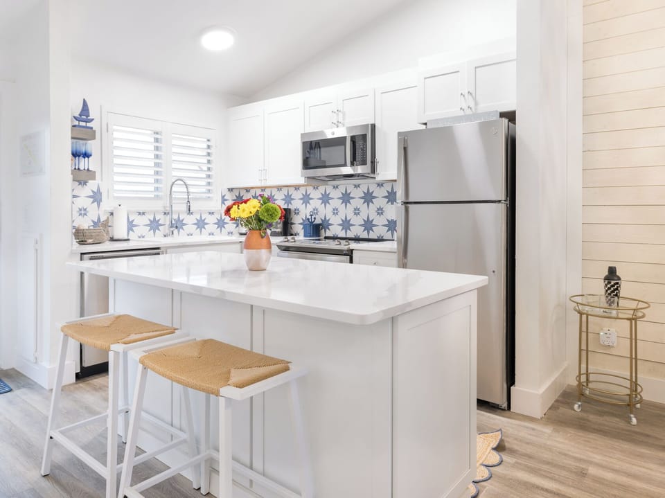 Whip up beach bites on the bright island with bar seating