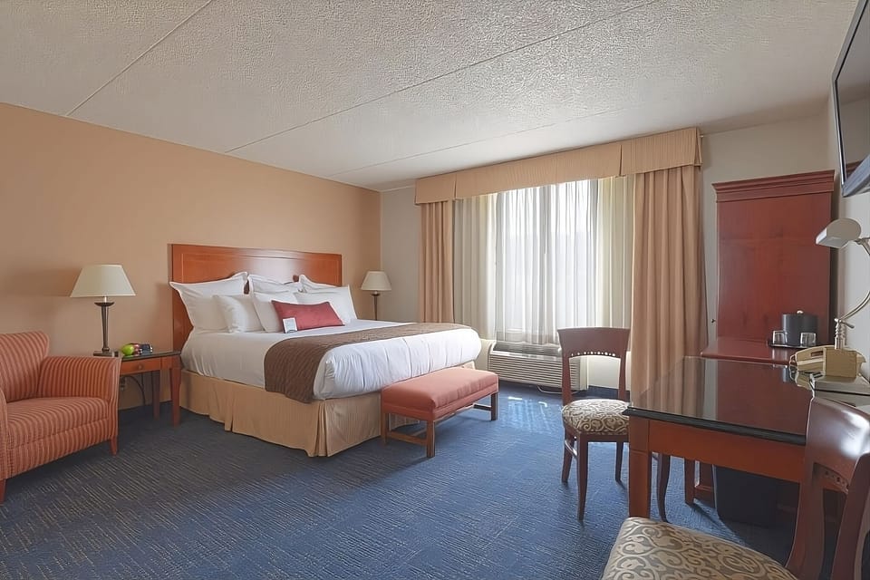 Settle into a crisp king bed for restful, quiet nights.