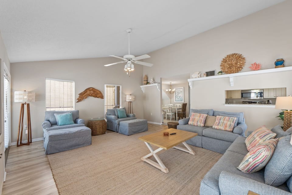 Unwind in this breezy coastal living room, where soft textures and beach-inspired accents invite you to relax with family after a sun-soaked day.