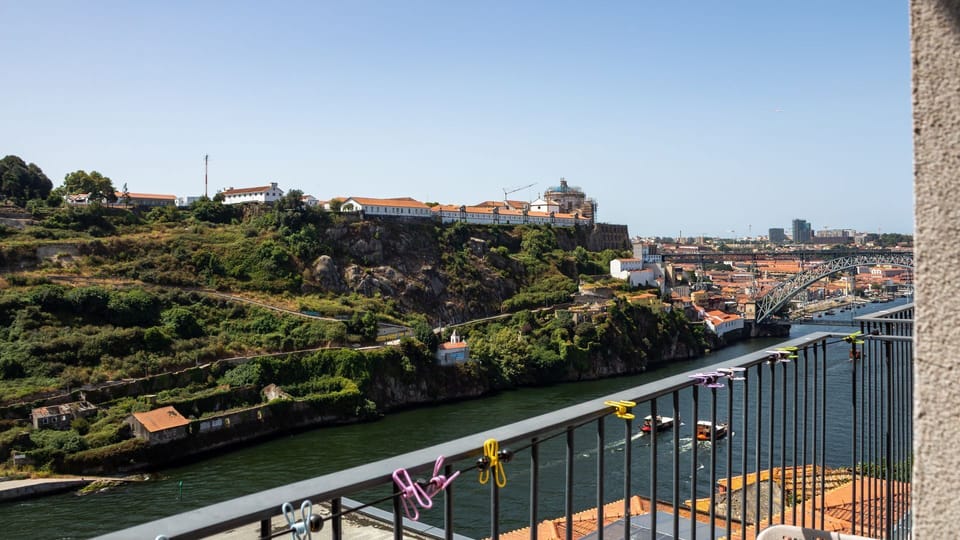 Step onto your private balcony and immerse yourself in a breathtaking panorama where the historic city meets the serene river and rolling hills, providing an unforgettable backdrop for your morning coffee or a tranquil evening unwind. This spectacular vie