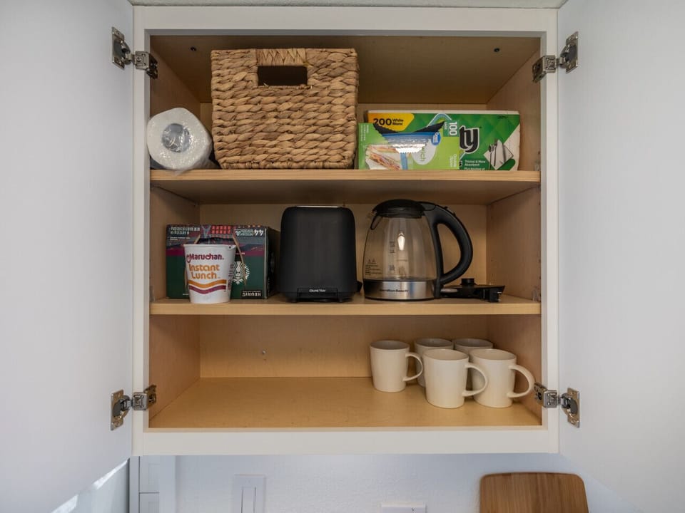 Thoughtfully stocked kitchen shelves - everything`s ready for your arrival