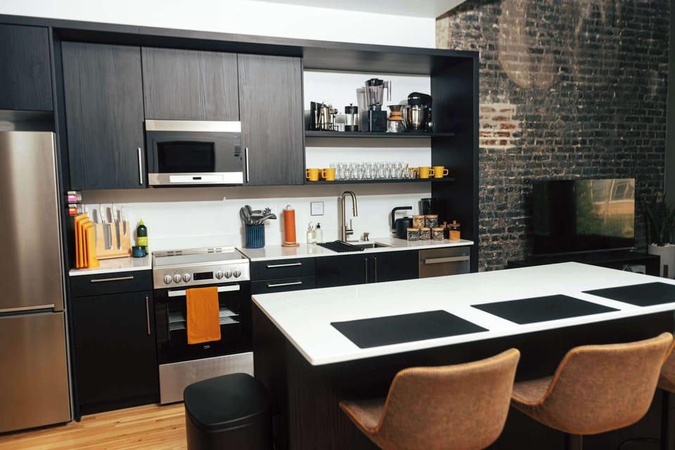 A well-equipped kitchen designed for real cooking — complete with quality tools, barware, and thoughtful details.