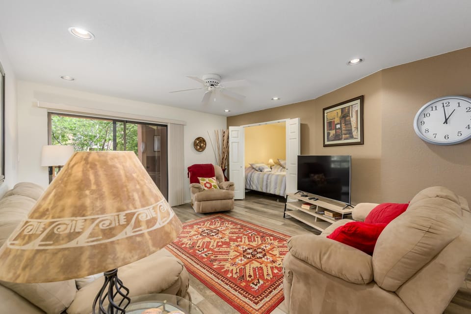 Cozy living room with plush seating and vibrant accents