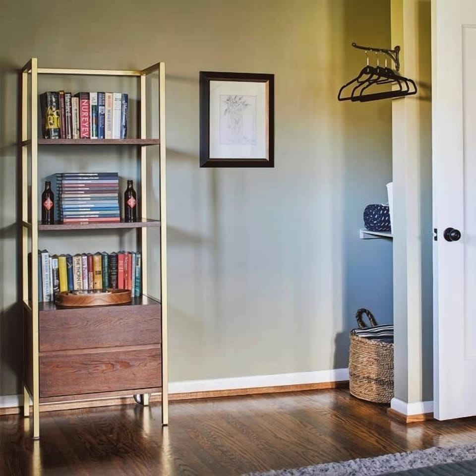 Enjoy a selection of books, curated just for this apartment, while you are with us. The closet offers space for you to both hang and fold your clothes.