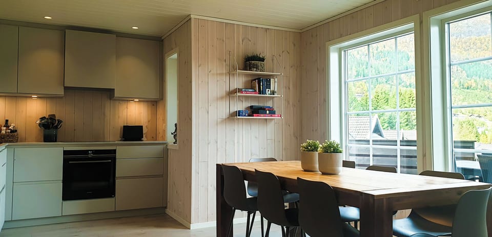 Living room with open kitchen solution