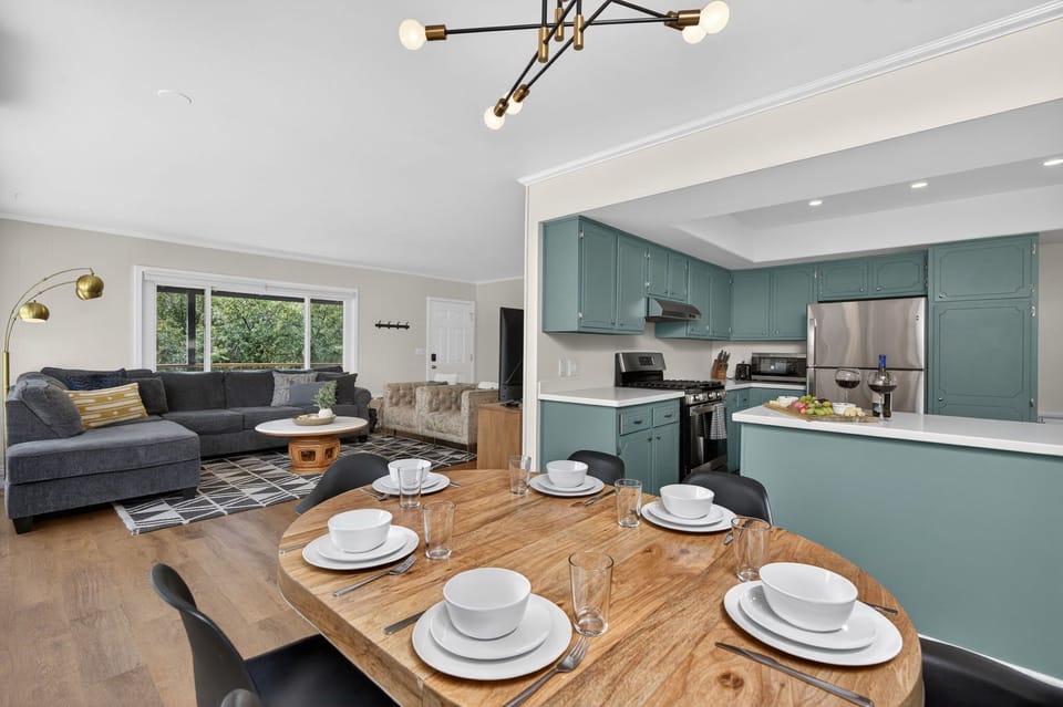Open dining area that flows into the kitchen and living room, making it easy to cook, dine, and spend time together.