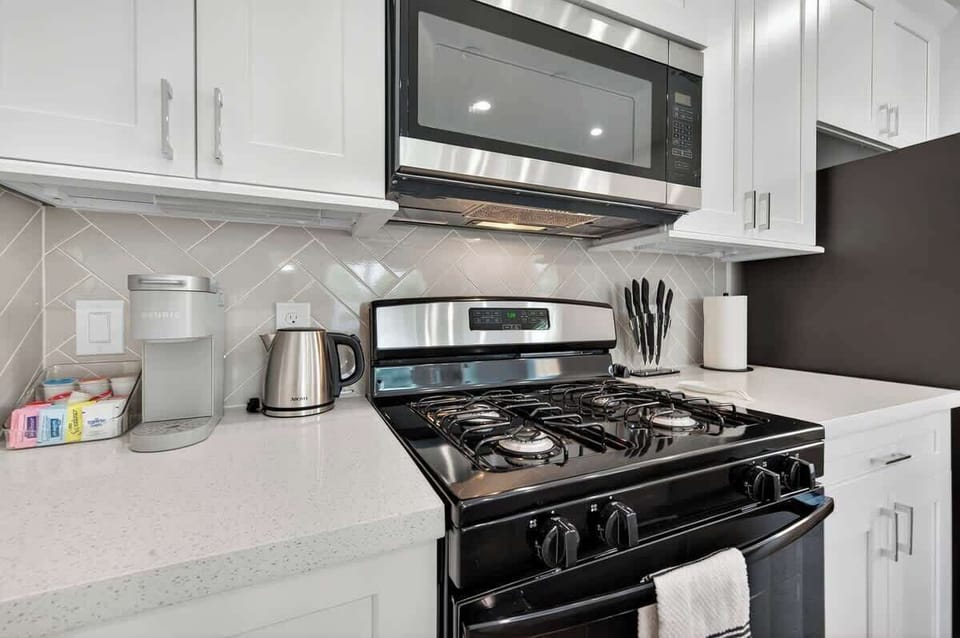 Convenient coffee and tea setup with Keurig, kettle, and essentials for a great morning start.