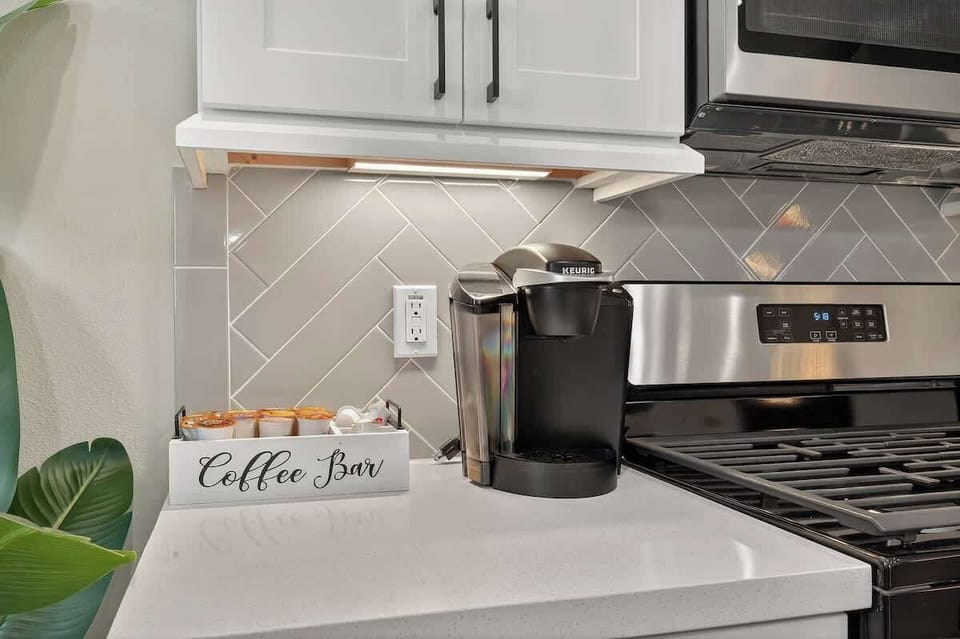 Coffee Bar: Sip your favorite brews at this stylish coffee station with a sleek design and vibrant ambiance!