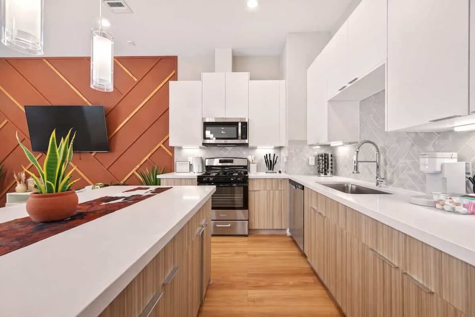 Modern Kitchen: Sleek countertops, stylish decor, and top-tier appliances await your culinary adventures!