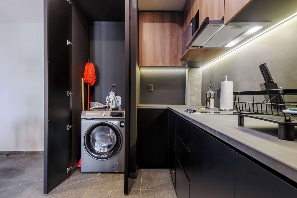 Laundry area next to the kitchen