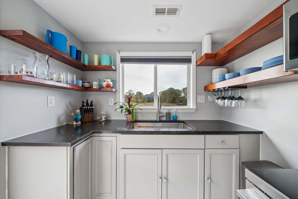 Even when doing dishes, this property offers you a view!