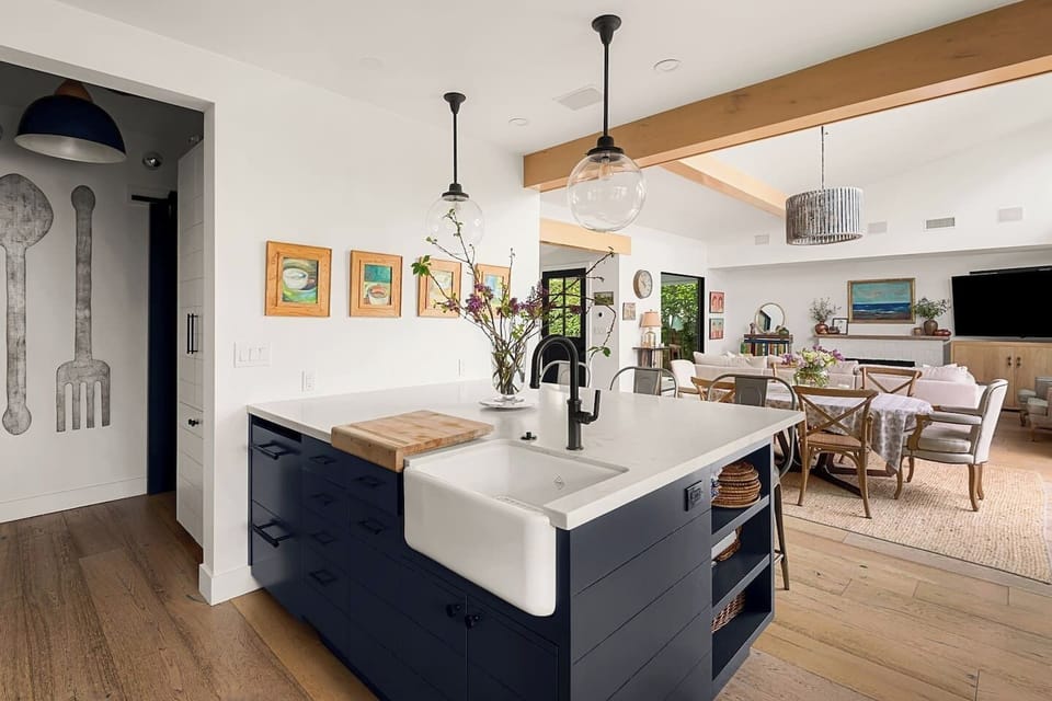 The kitchen opens right into the dining area — bright, airy, and designed for easy everyday living.