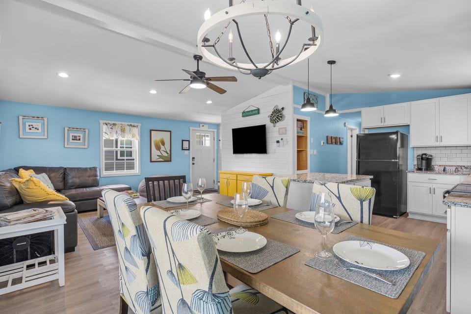 A cozy and comfortable dining space perfect for enjoying breakfast before the beach or dinner after exploring Surf City