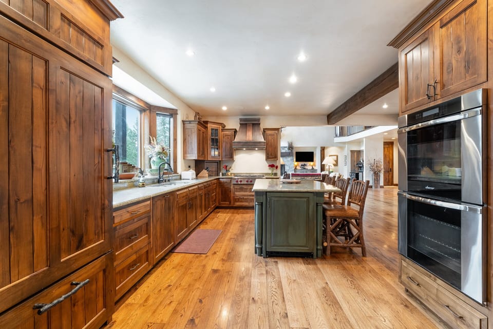 Custom fridge and built in oven and microwave. | Main Level