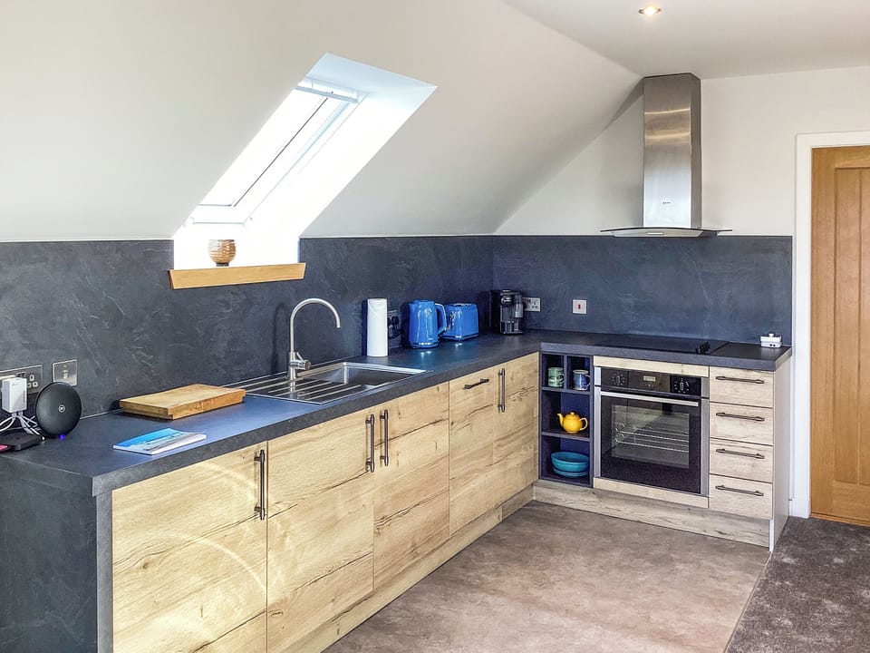 Open plan living space | Sundown Apartment, Thurso