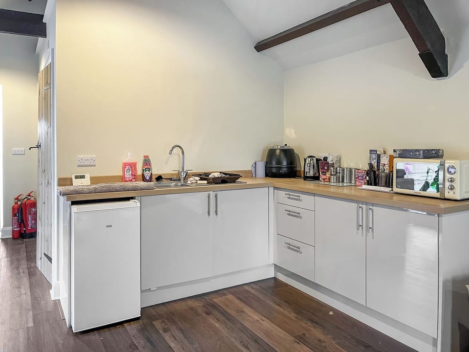 Kitchen area | Ember Sky Yurt - Redstead Accomodation, Beadnell