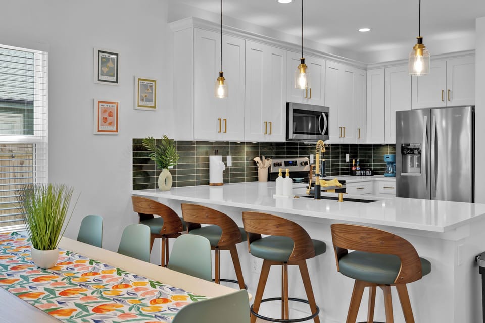 Kitchen #1 - chef-ready kitchen stocked with everything you need: spices, cookware, utensils, small appliances, coffee bar and bar seating for 4.