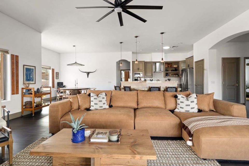 Open concept living room, kitchen and dining.