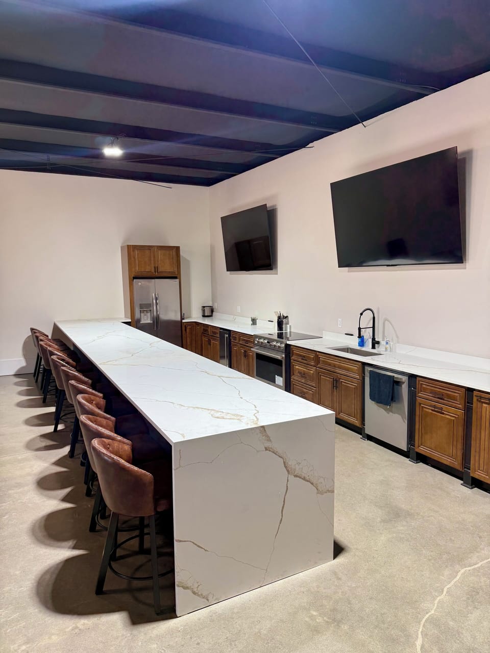 2 - 85'' smart TV's in the kitchen area
