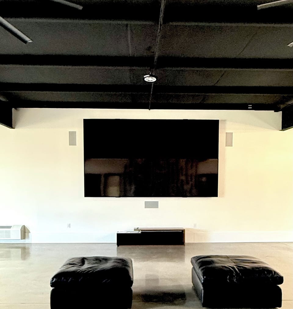 Massive wall TV!  Watch one game or 4 different ones.