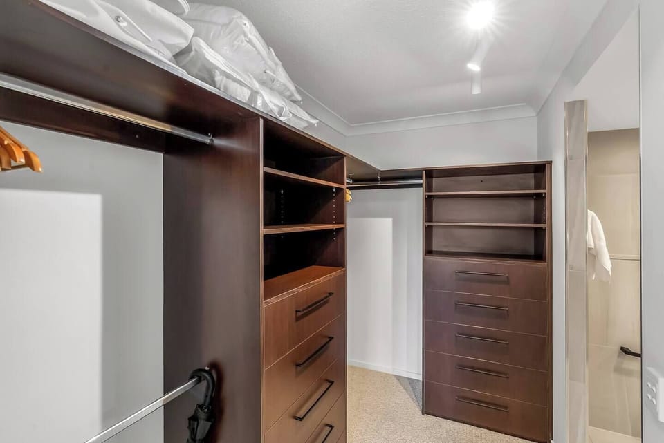 Settle into the walk-in wardrobe in the primary bedroom, offering ample space to unpack and organise.