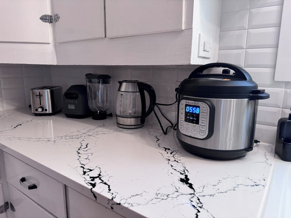Kitchen has the appliances needed for real cooking 