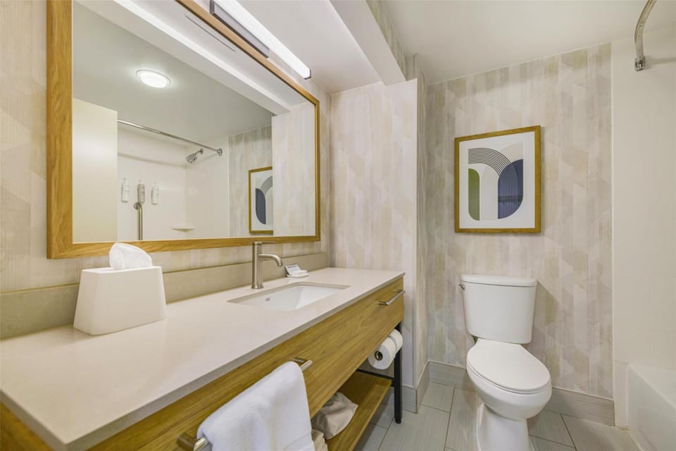 Refresh at the bright vanity with plenty of counter space.