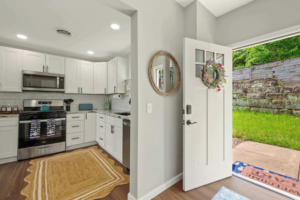 Bright kitchen w/ modern finishes & direct access to the outdoor space