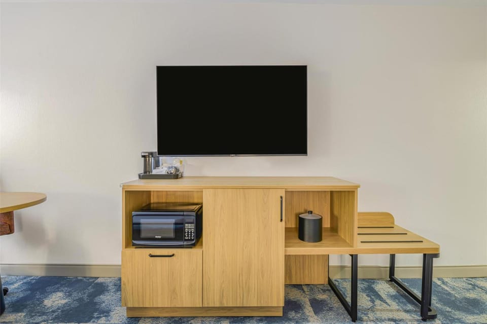 Enjoy handy in-room essentials with microwave and smart storage.