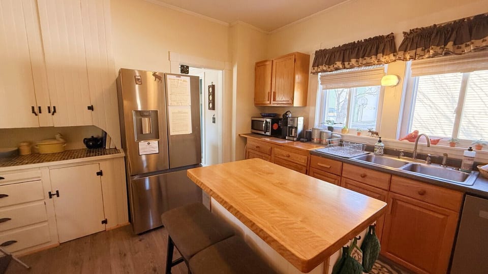Fully stocked kitchen with modern appliances for easy home-cooked meals