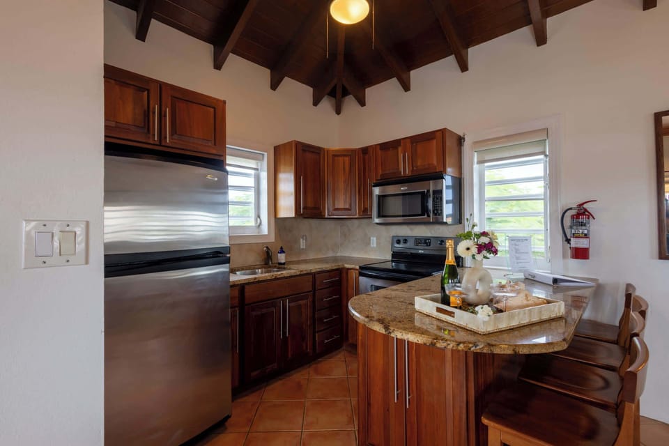 Fully Equipped Kitchen with Granite Countertops & Stainless Appliances