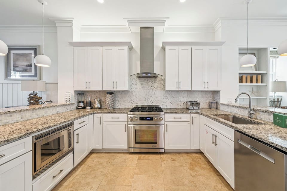 Your gourmet kitchen awaits with granite counters, stainless appliances, and everything you need to create memorable meals during your stay.