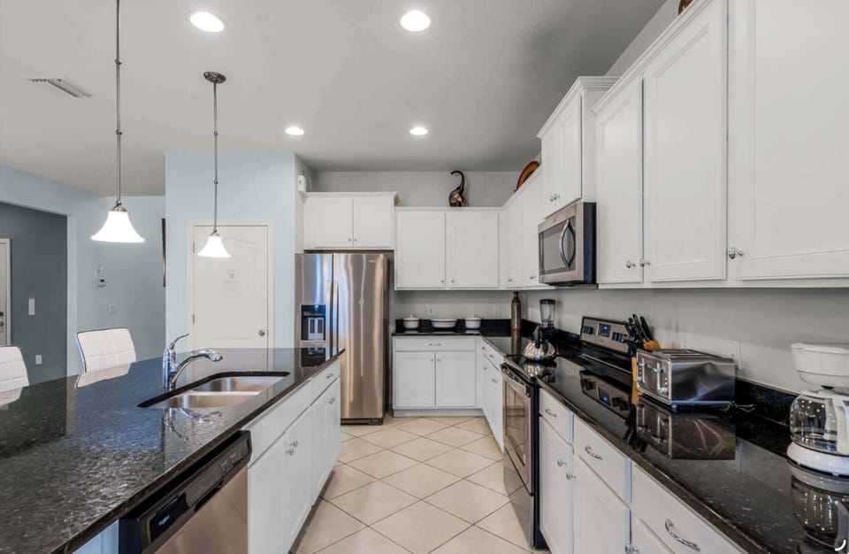 The sophisticated kitchen is well equipped for an unforgettable getaway​