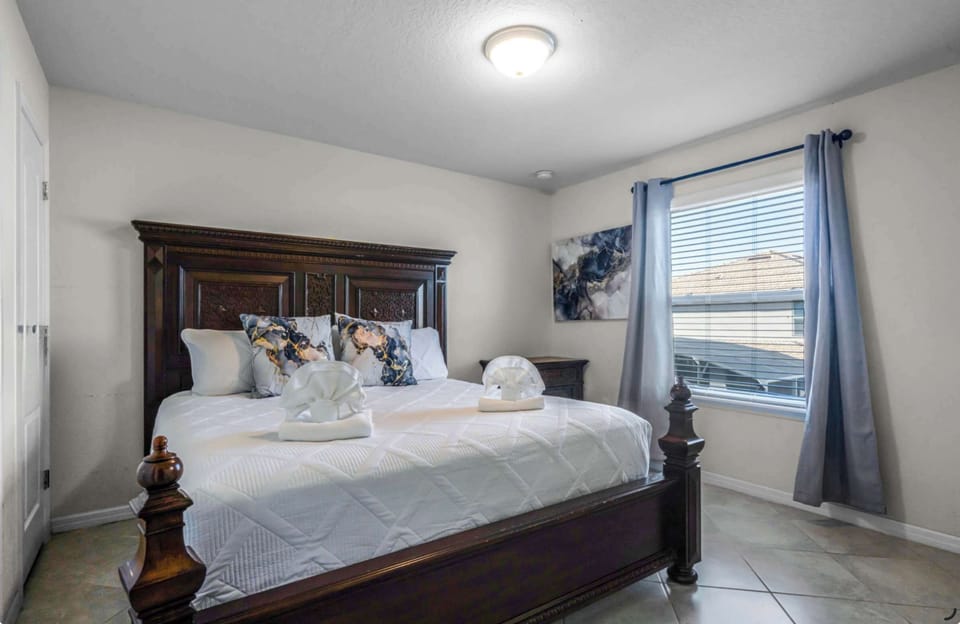 A king-sized bed, smart TV, and ensuite bath await in the final bedroom retreat​