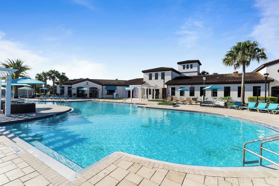 Lounge the day away in the sunshine at one of the spacious community pools​