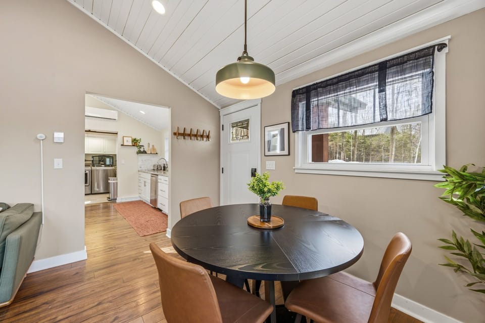 Gather around this quaint dining space to share delicious meals, linger over good conversation, or enjoy a cozy game night together.