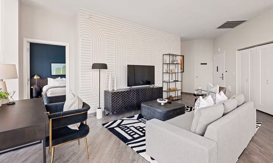 Stretch out for movie nights in a stylish, sunlit living room.