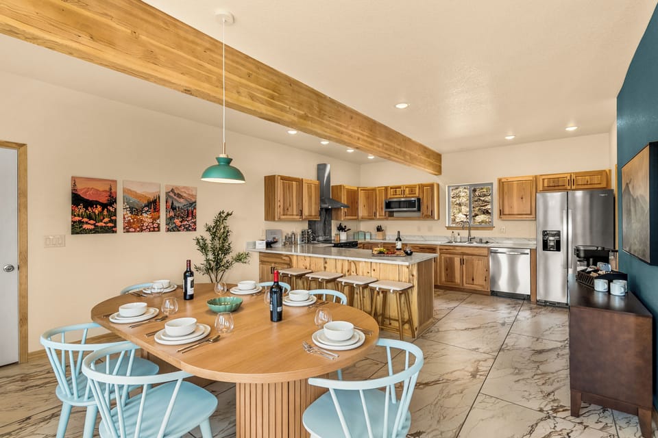 An open-concept floor plan seamlessly connects the dining area and kitchen