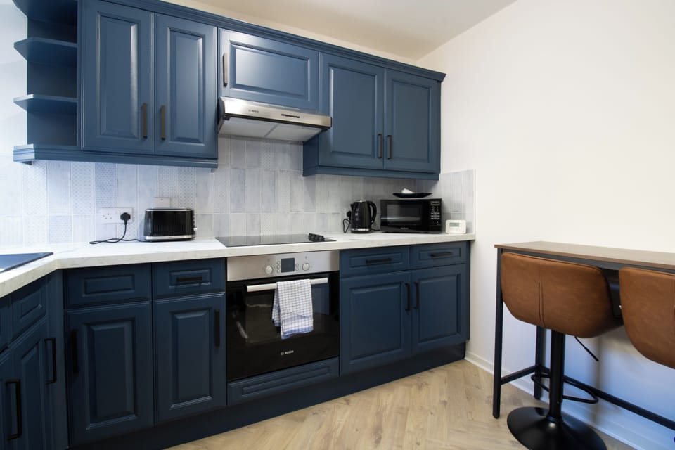 Whether you’re brewing morning coffee or preparing a family meal, this kitchen has everything you need.
