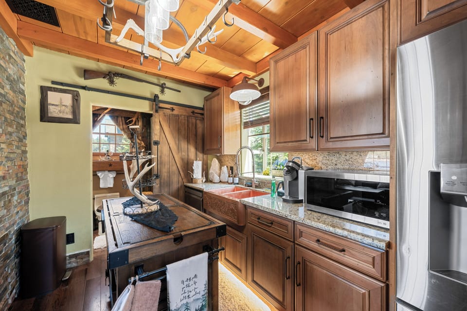 Kitchen - Full Kitchen with outdoor BBQ – Propane, Wolf Range Stove/Oven, Dishwasher, Microwave, Frigidaire Fridge, K-Cup Coffee Maker, and Dishwasher