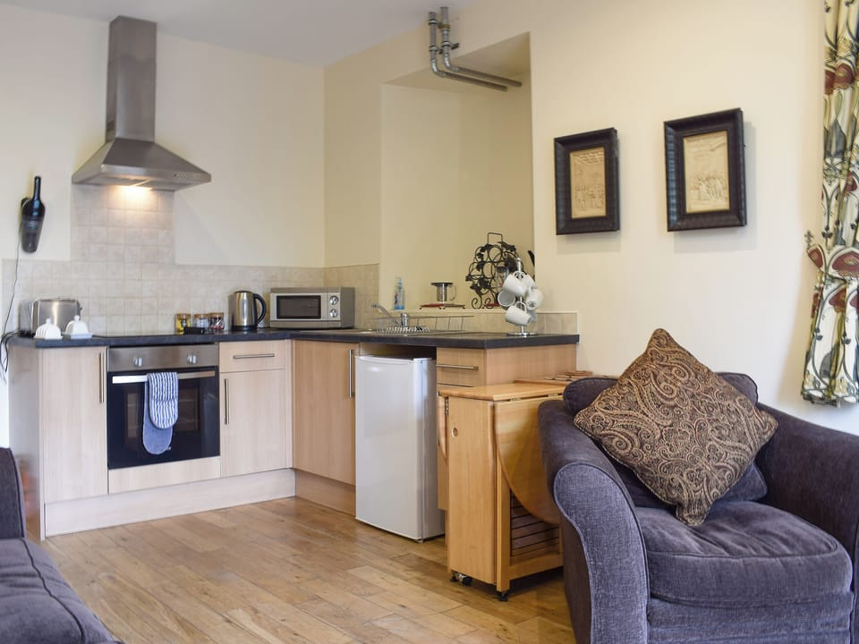 Well equipped kitchen area | Rose Cottage - Auchendennan, Arden, Alexandria