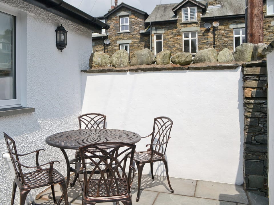 Sitting out furniture in enclosed rear courtyard | Water Howes Cottage, Ambleside