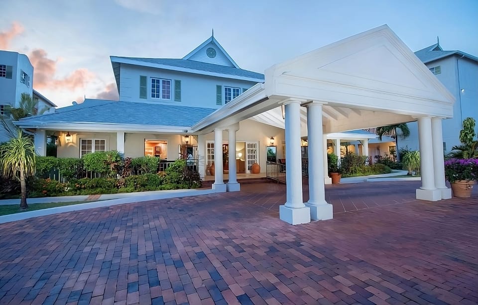 Arrive effortlessly under the grand covered porte-cochère entrance.