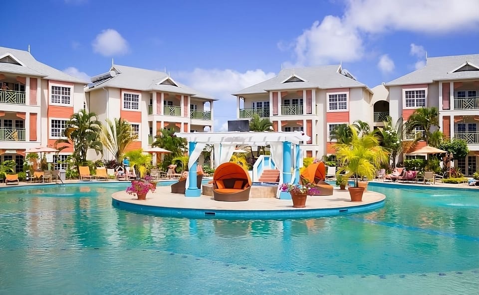 Dive into the resort-style pool with in-water lounging islands.