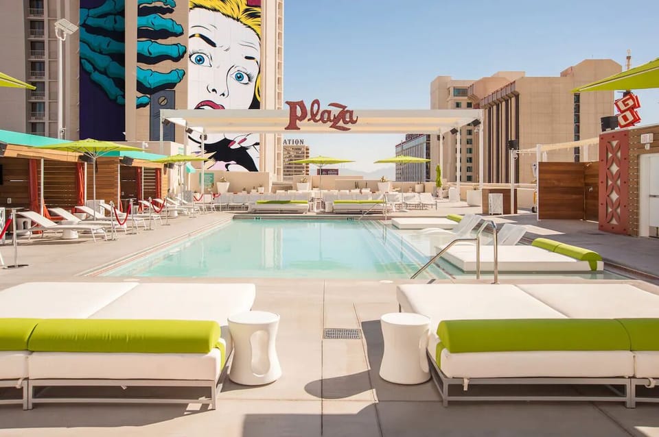 Dive into sun-soaked lounging with iconic rooftop pool views.