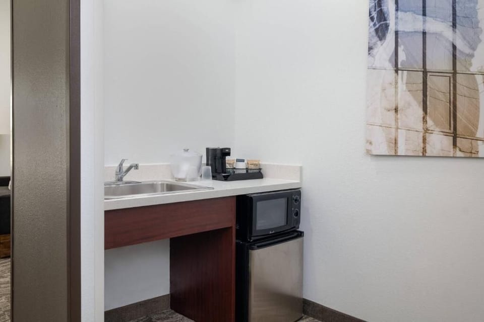 Refresh snacks anytime with convenient in-room kitchenette setup.