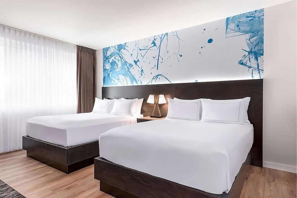 Drift off comfortably in a spacious double-bed room with glow.